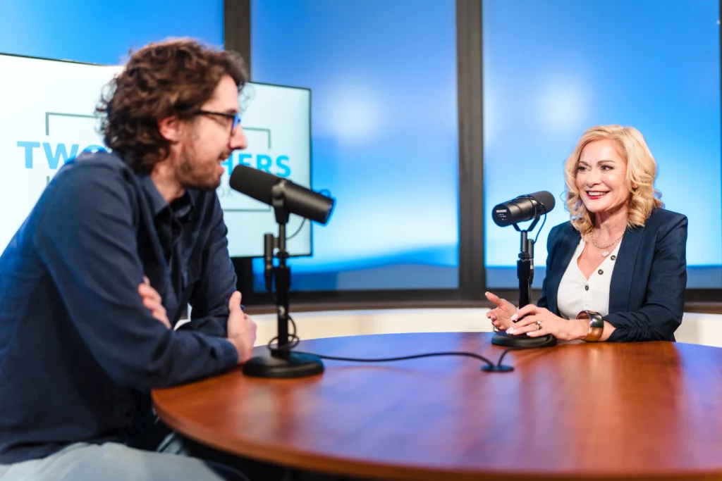 Tracy Winkler sits with Ben Tompkins to record a podcast.